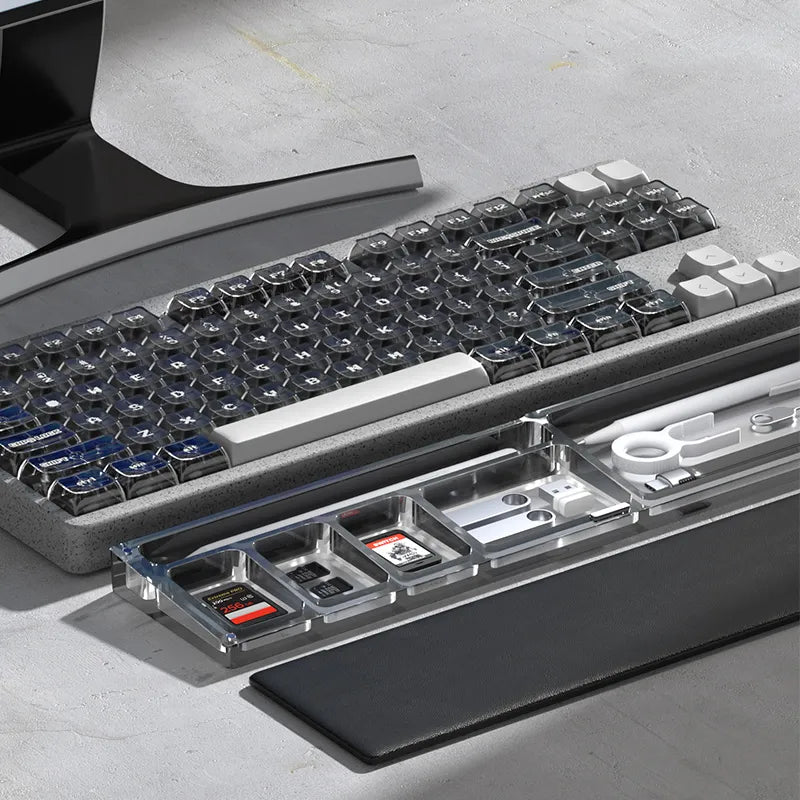 Close-up of a transparent keyboard with internal components on a concrete surface
