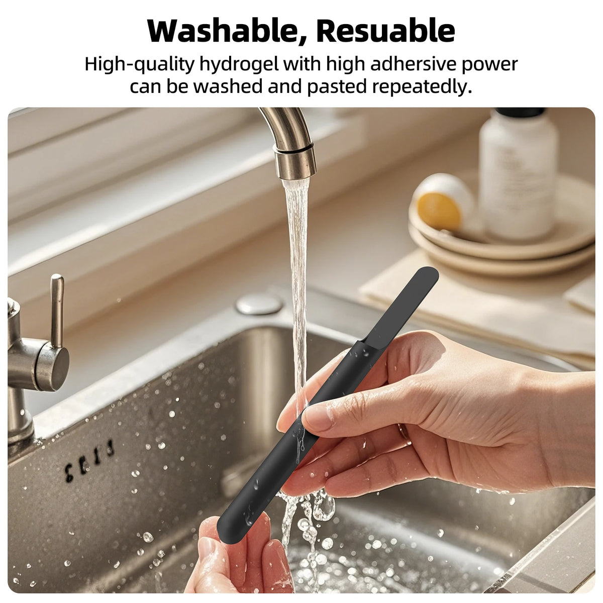 Hand washing a reusable hydrogel product under running water in a kitchen sink.