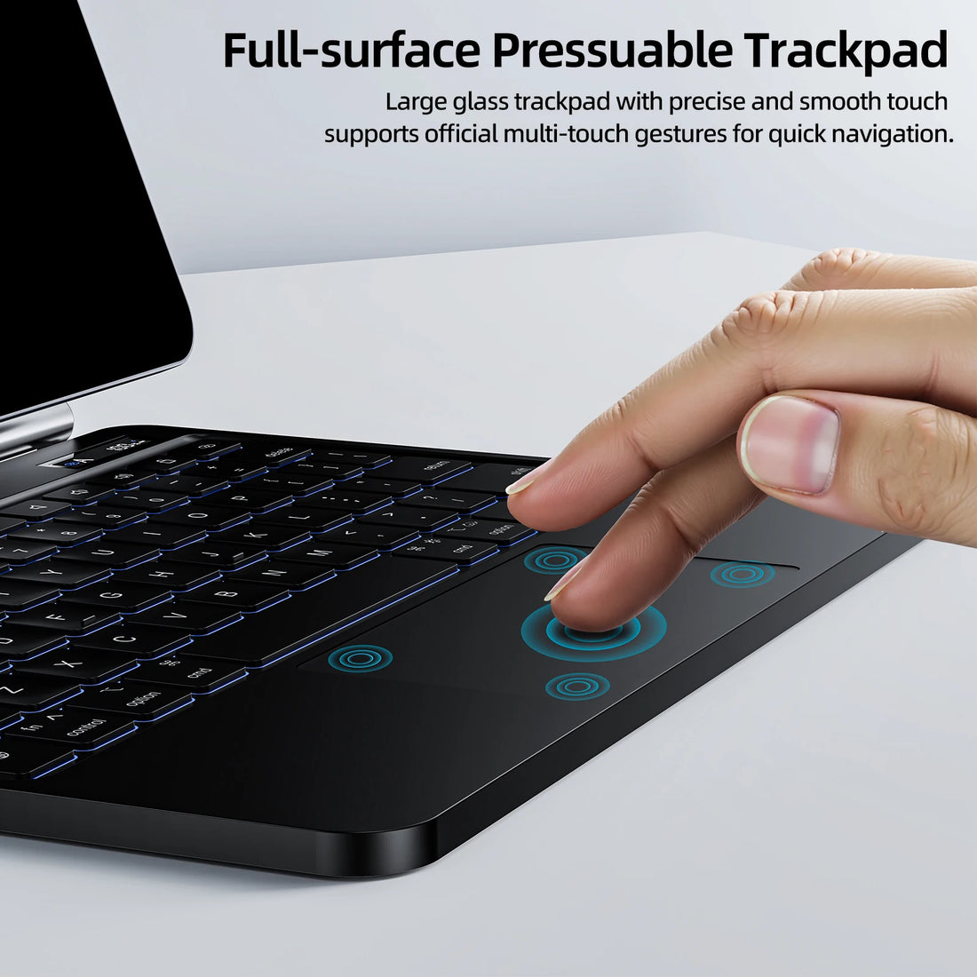 Laptop with a full-surface pressuable trackpad and a hand interacting with it.