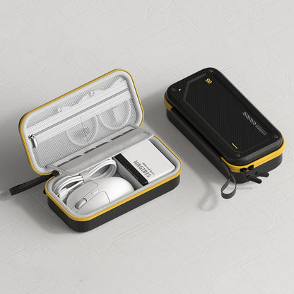 Black and yellow carrying case with a mouse, cable, and power bank on a light gray background