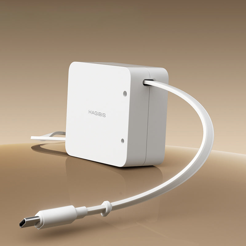 White electronic device with a cable on a beige background