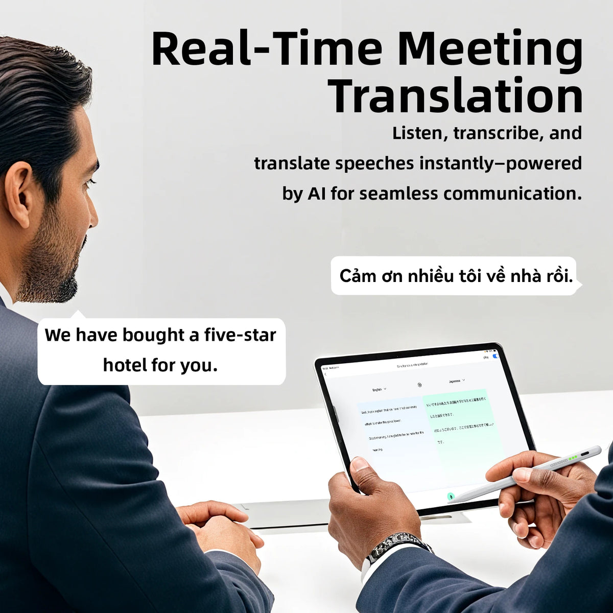 Two people in a meeting with real-time translation on a screen.