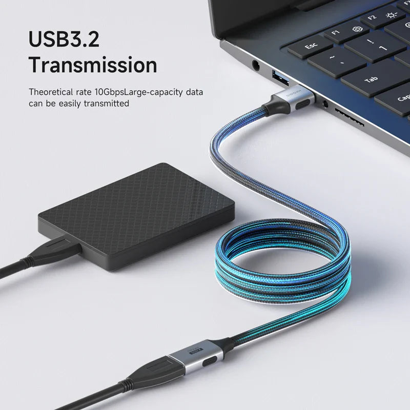 USB external hard drive connected to a laptop with USB cable, highlighting USB3.2 transmission.