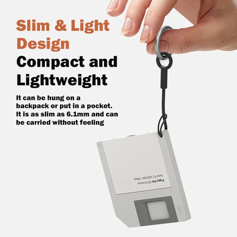 Small device with a keychain attached, held by a hand, on a white background with text about its slim and light design.