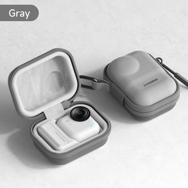 Gray carrying case with a camera inside on a light gray background