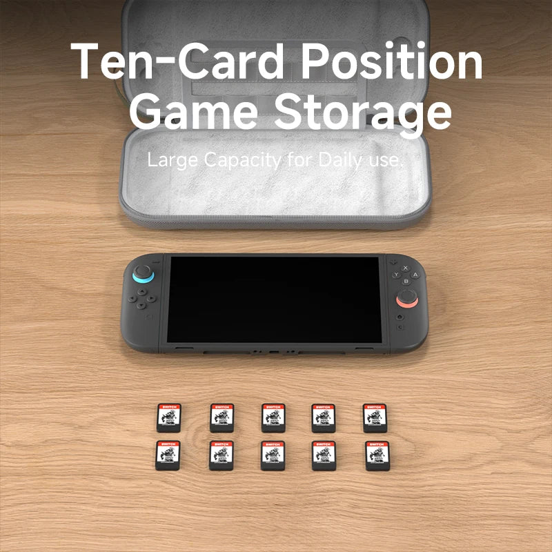 Card storage case with cards and gaming console on a wooden surface