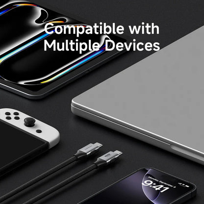 Multiple electronic devices including a smartphone, tablet, gaming console, and cable on a dark surface with text 'Compatible with Multiple Devices'.