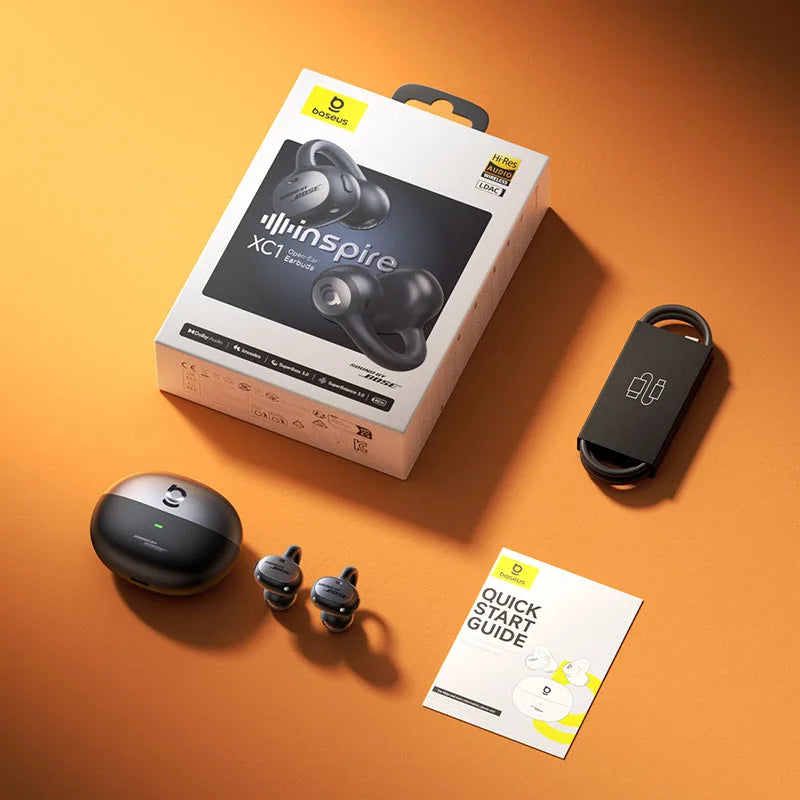 Hansphere Inspire XCI wireless earbuds packaging with earbuds and charger on an orange background