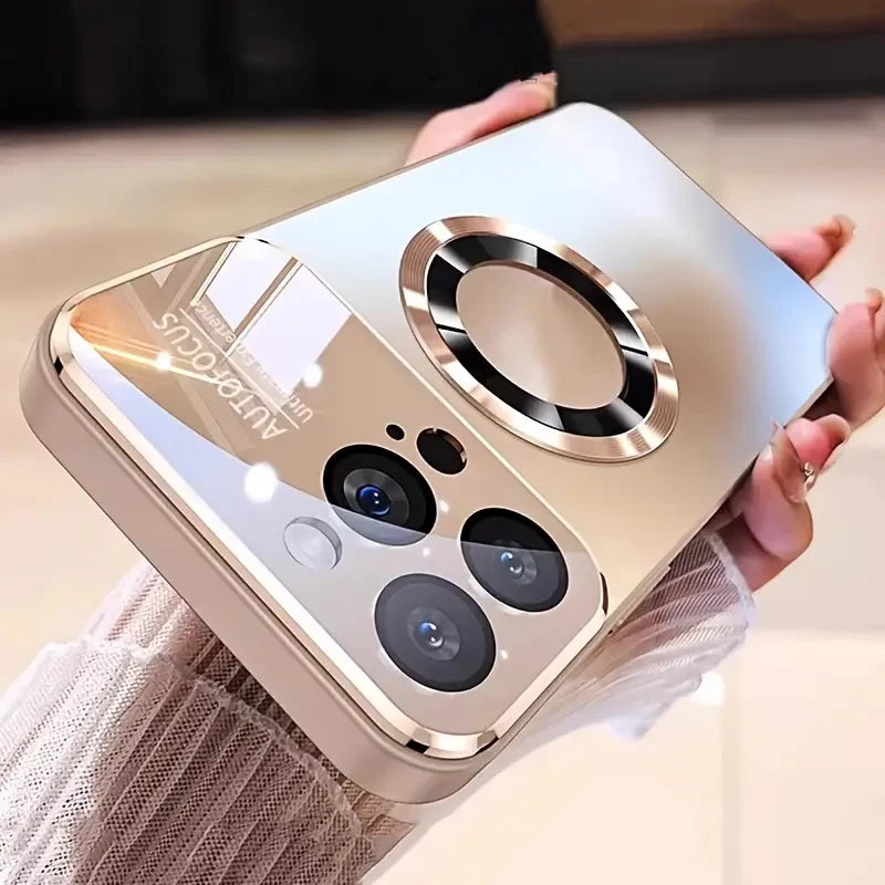 Smartphone with a gold and white design held by a person