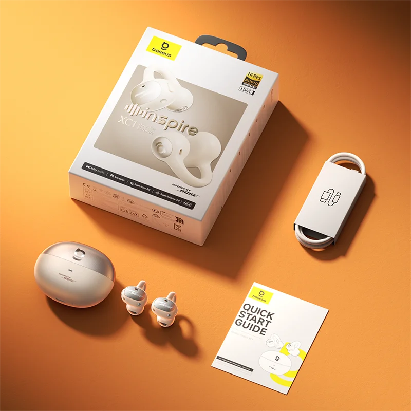 White wireless earbuds with packaging, earbud case, and quick start guide on an orange background