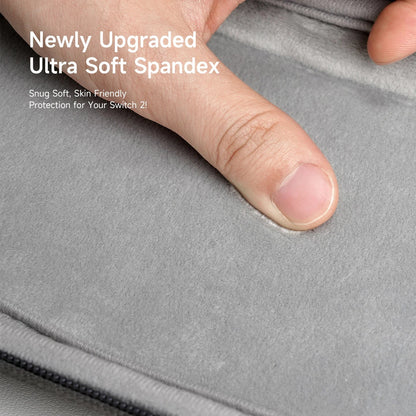 Gray spandex fabric with a finger pressing on it, text indicating 'Newly Upgraded Ultra Soft Spandex'.