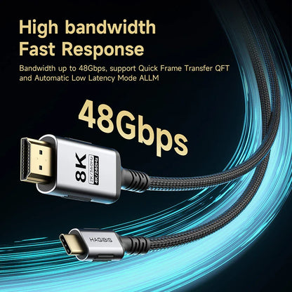 An 8K HDMI 2.1 cable with a USB-C connector, shown against a dark background with glowing blue light streaks and text highlighting 48Gbps bandwidth and fast response.