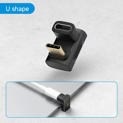 Black U-shaped cable management tool with USB-C connector on a light gray background