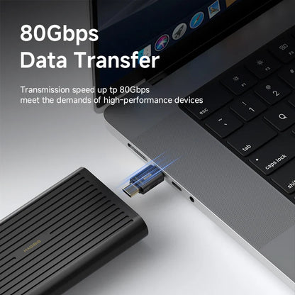 USB drive connected to a laptop with text highlighting 80Gbps data transfer speed.