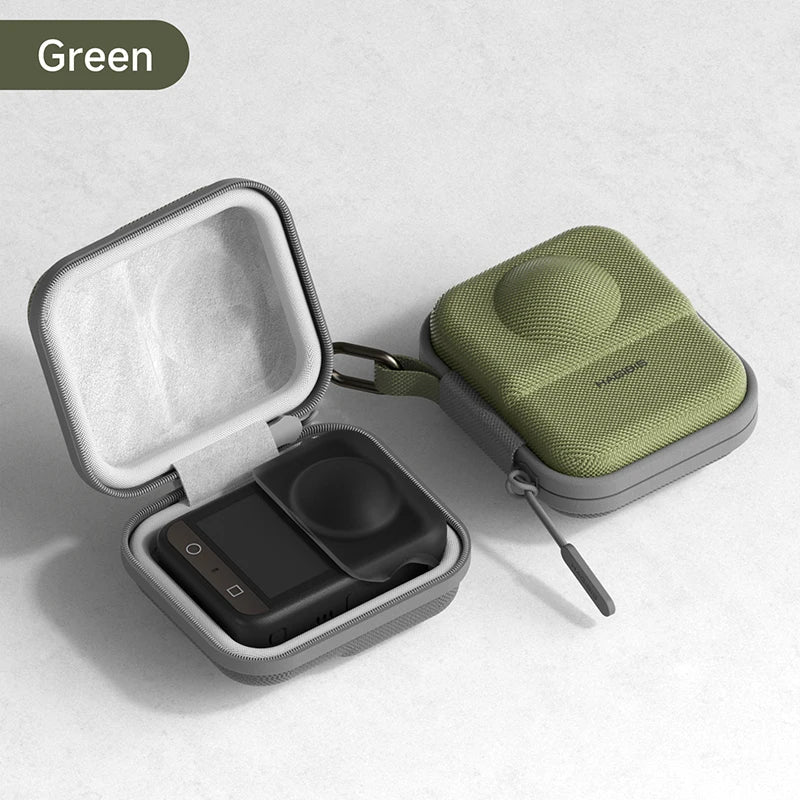 Green travel case with a black device inside on a light gray background