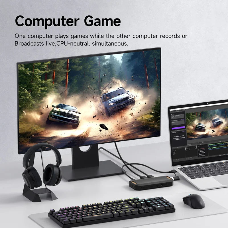 Computer setup with dual monitors displaying a racing game, keyboard, mouse, and headphones on a white desk.