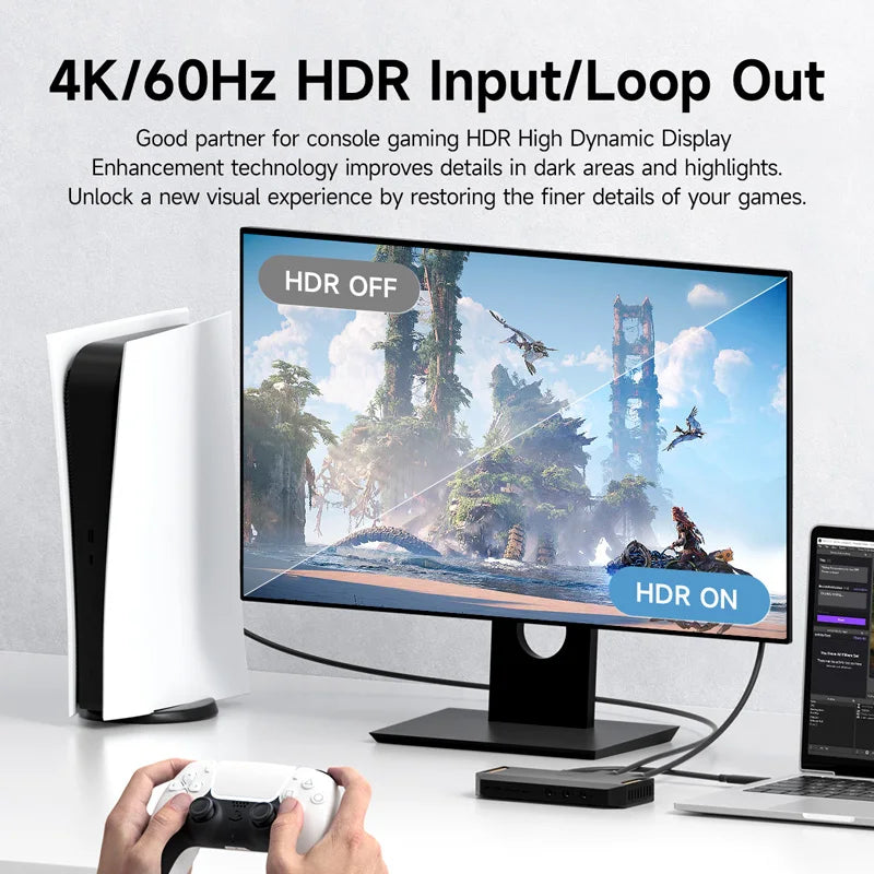 Gaming setup with monitor displaying HDR effect, controller, and laptop on a white background.