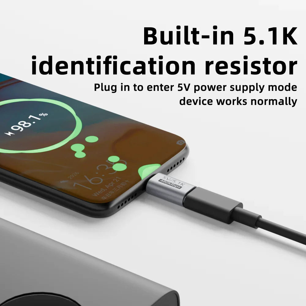 Phone with a charging cable and text about a built-in identification resistor.