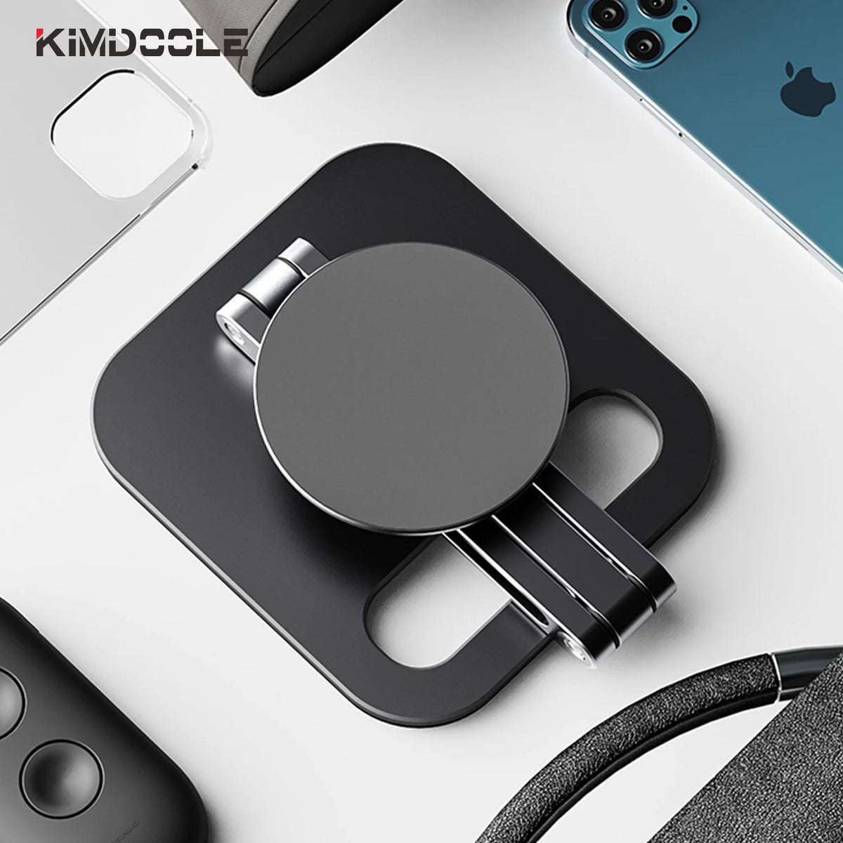 Black phone stand with Apple product in the background
