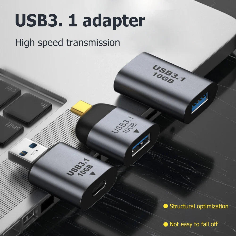 USB3.1 adapter with high-speed transmission on a laptop background
