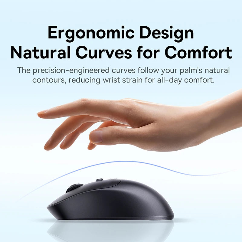 Ergonomic mouse with a hand reaching towards it on a light blue background
