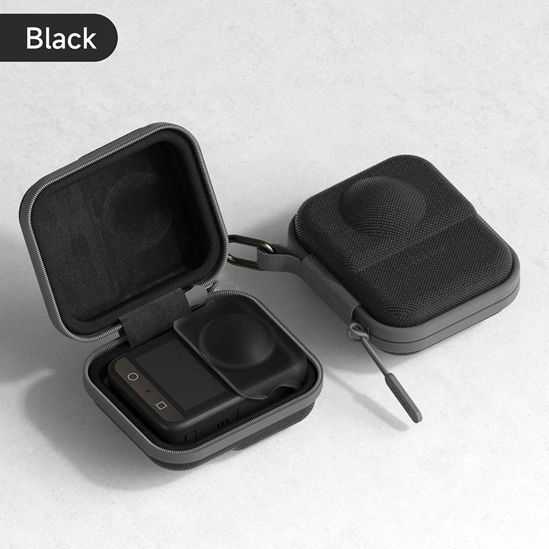 Black hard-shell carrying case for electronic devices on a light gray background