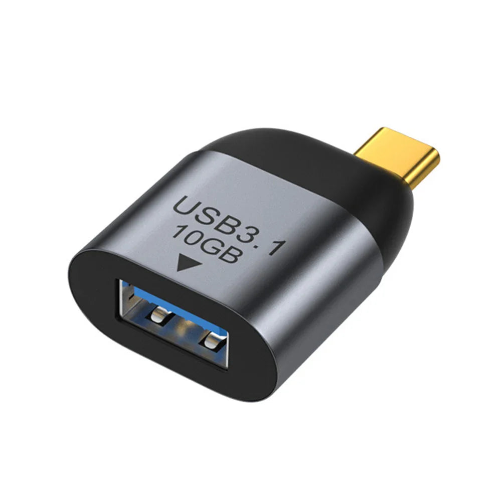 USB 3.1 adapter with black body and gold connector on a white background