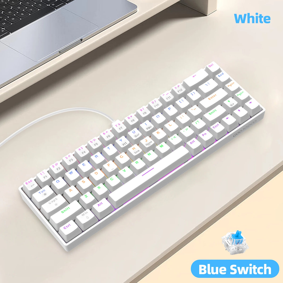 Keyboard with blue switches on a desk next to a laptop, labeled 'White' and 'Blue Switch'.