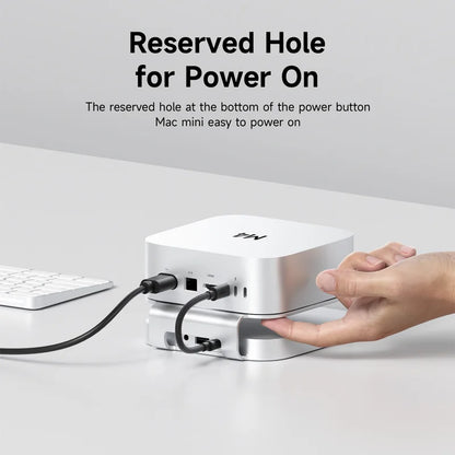Hand plugging a cable into a white device with text about power on mechanism.