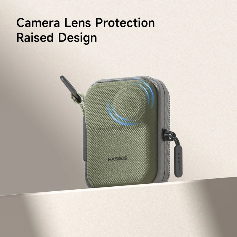Green camera lens protection case with 'Hama' branding on a neutral background