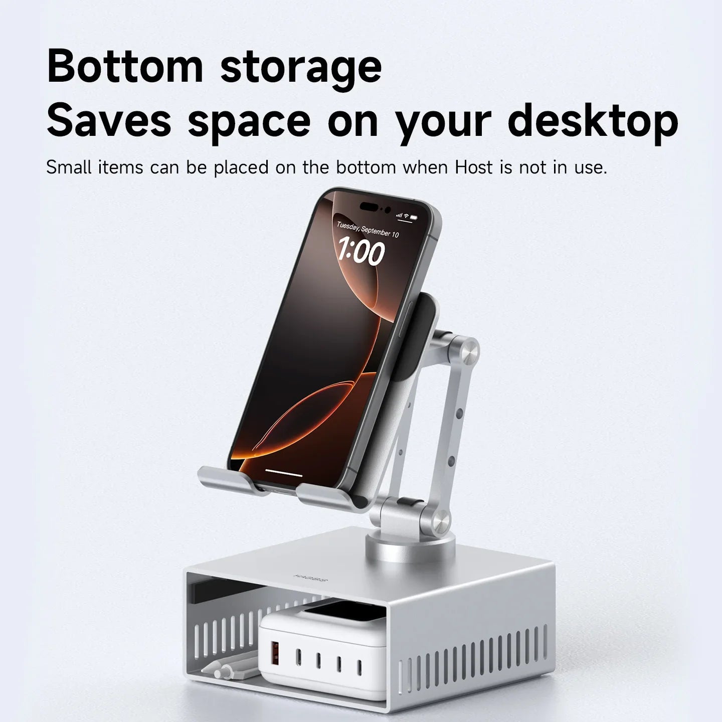 Phone stand with bottom storage compartment on a light gray background