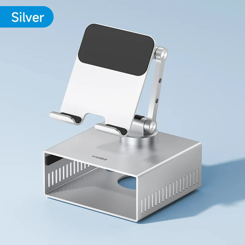 Silver phone stand with black screen on a light blue background