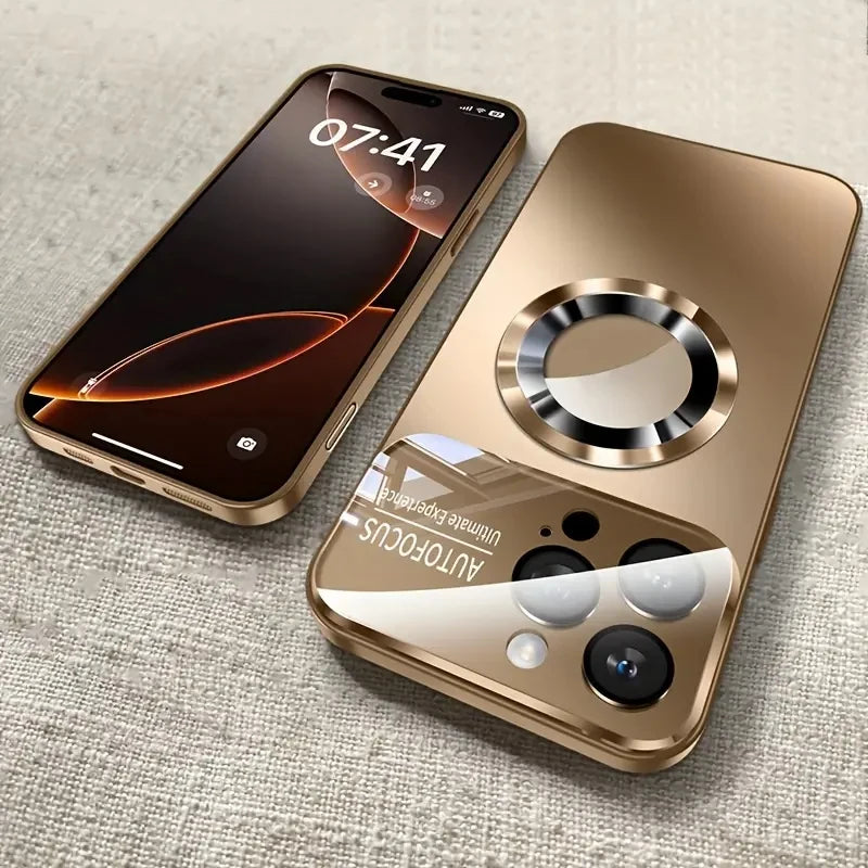 Gold smartphone with metallic case on a textured surface