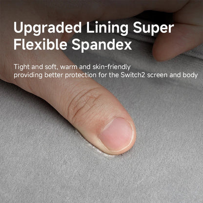 Hand holding a gray fabric with text about upgraded lining and spandex material.
