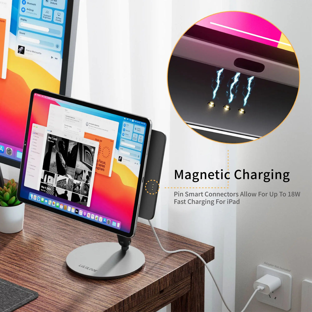 Tablet on a stand with magnetic charging feature, showing close-up of charging ports.