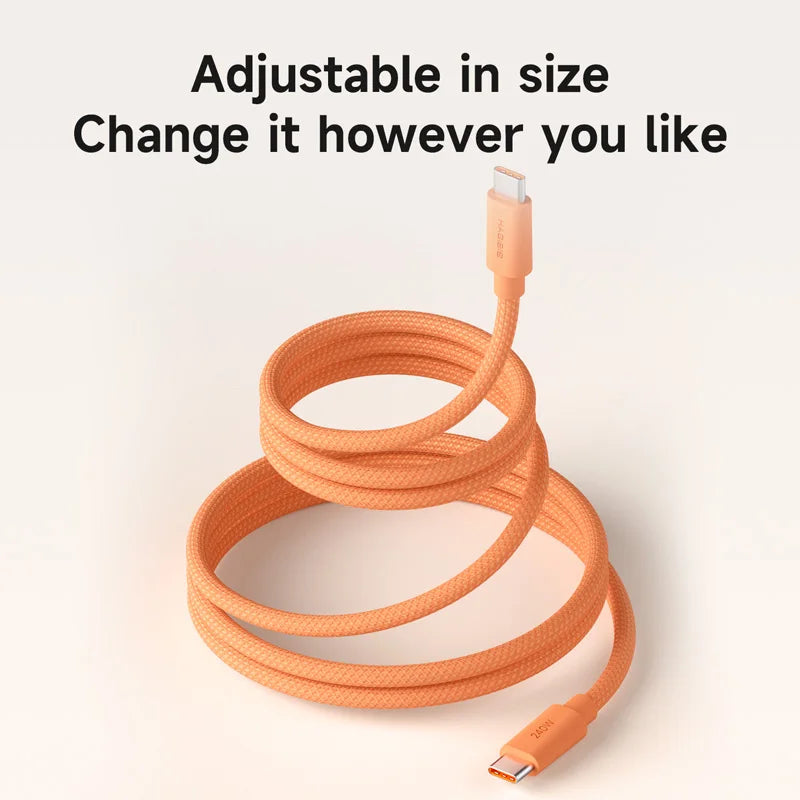Orange adjustable cable on a light beige background with text.