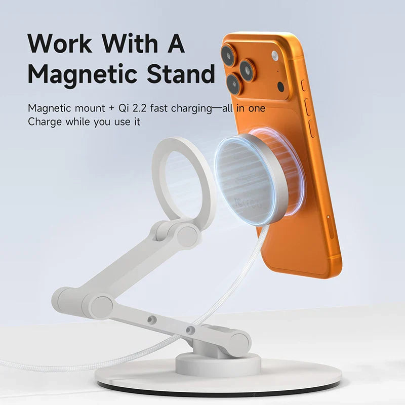 Orange phone on a white magnetic stand with text about magnetic mount and Qi charging.
