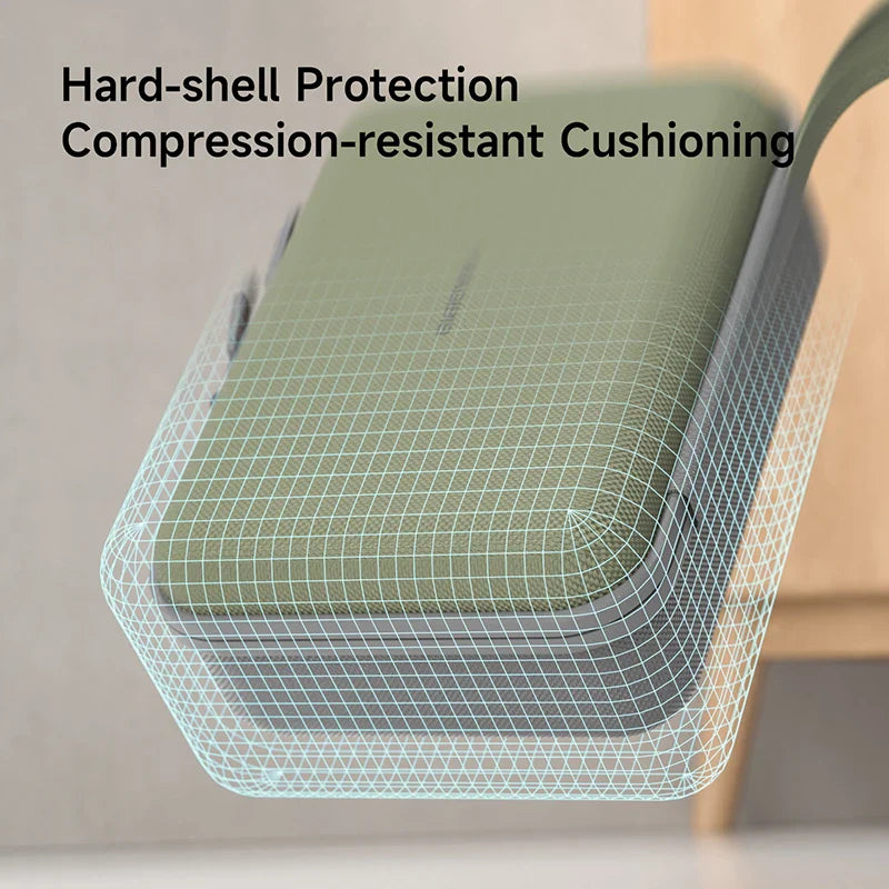 Green cushion with hard-shell protection and compression-resistant cushioning on a chair.
