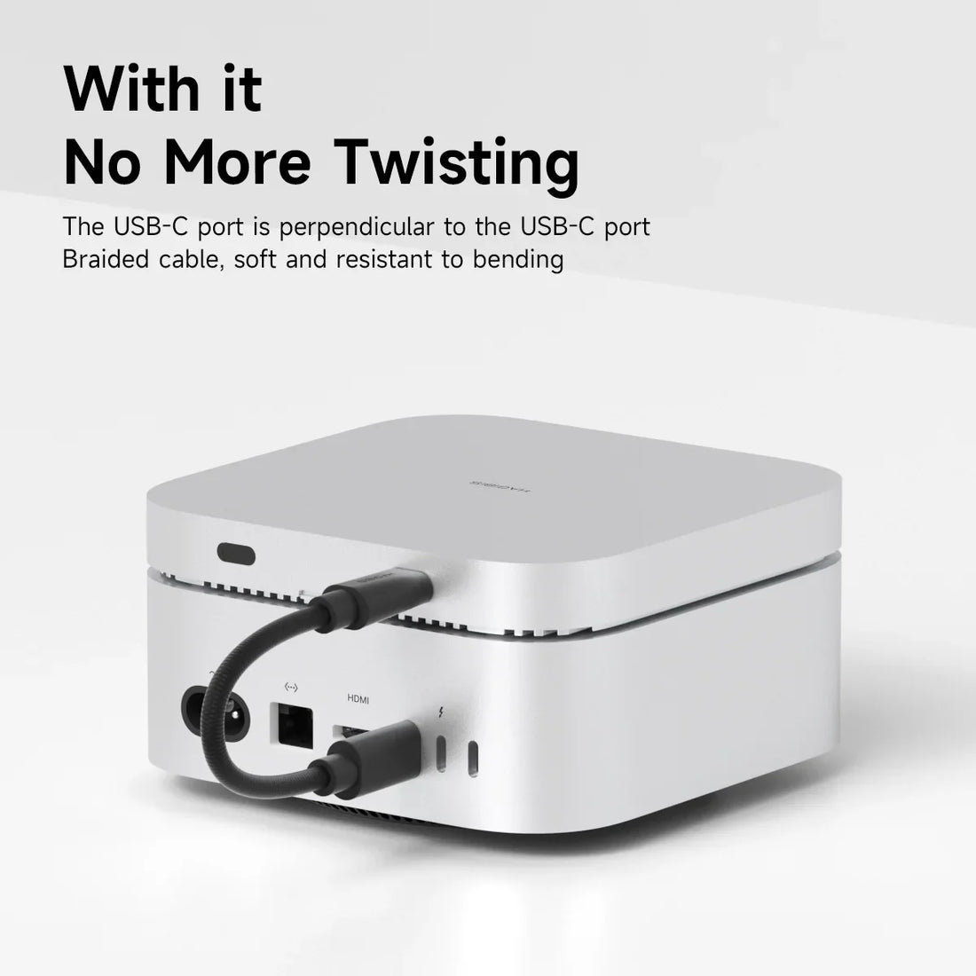 White electronic device with a USB-C cable on a light gray background