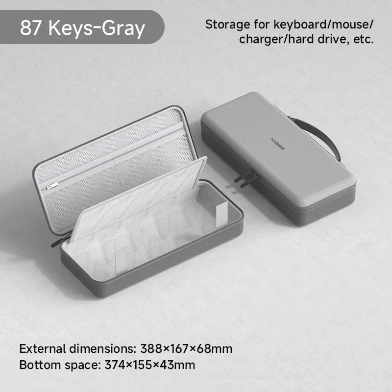 Gray storage case with open lid showing compartments on a light gray background