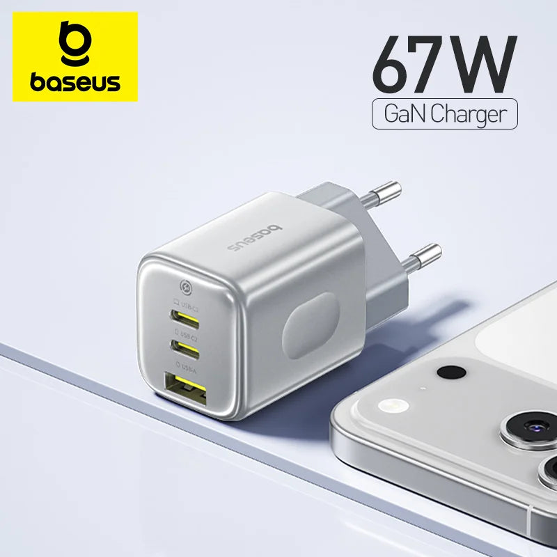 Baseus 67W GaN charger with a smartphone on a light gray background