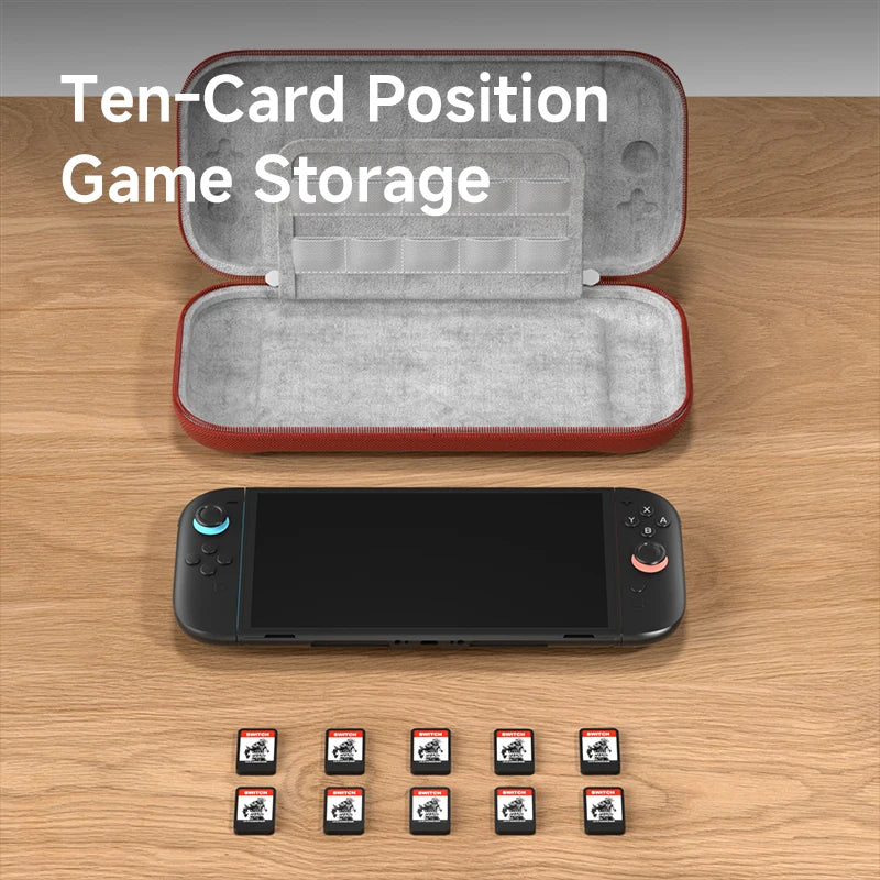 Game console with cartridges and open storage case on a wooden surface