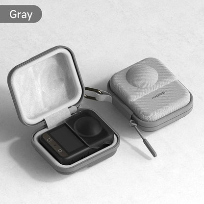 Gray carrying case with a black device inside on a light gray background