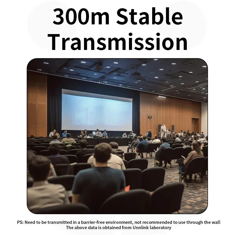 Auditorium with people attending a presentation on a large screen, with text about '300m Stable Transmission'.