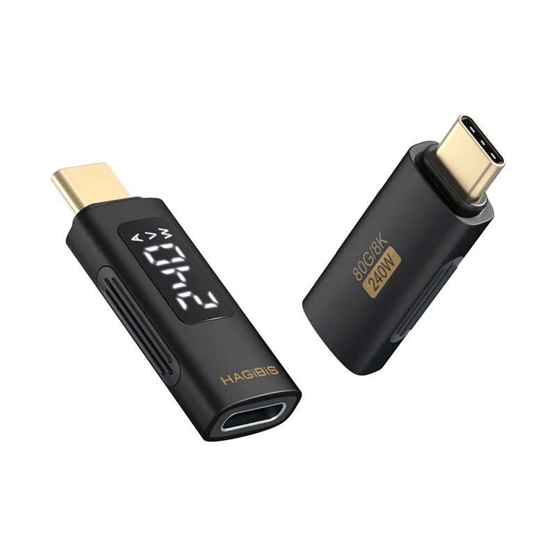 Two black electronic devices with gold connectors on a white background