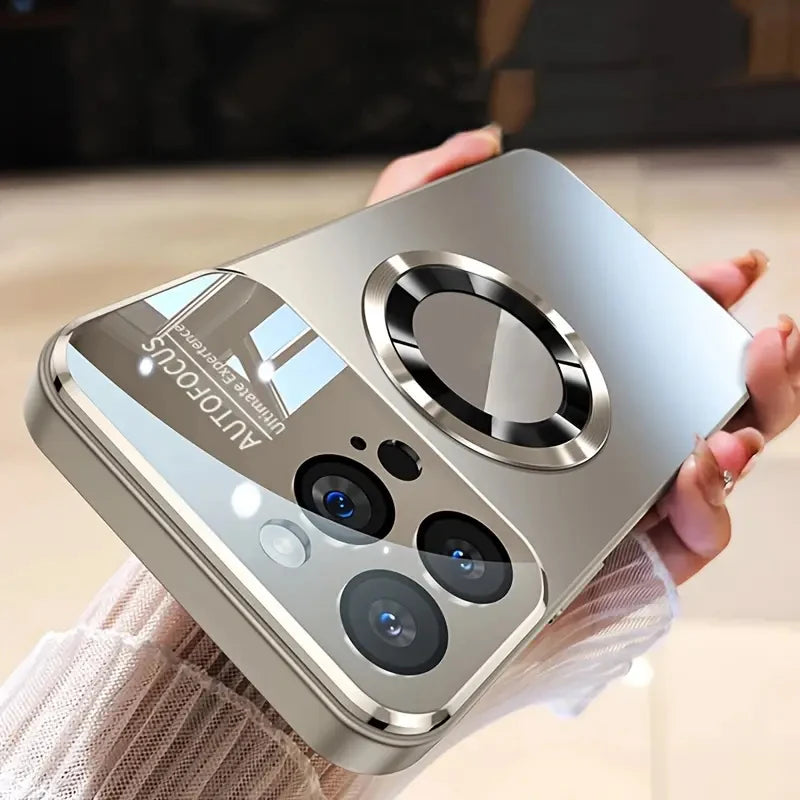 Silver phone case with reflective surface held by a person