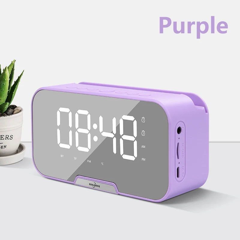 A portable Bluetooth speaker with smart alarm clock features displayed on a LED screen, with options for Bluetooth, TF card, and AUX audio input.