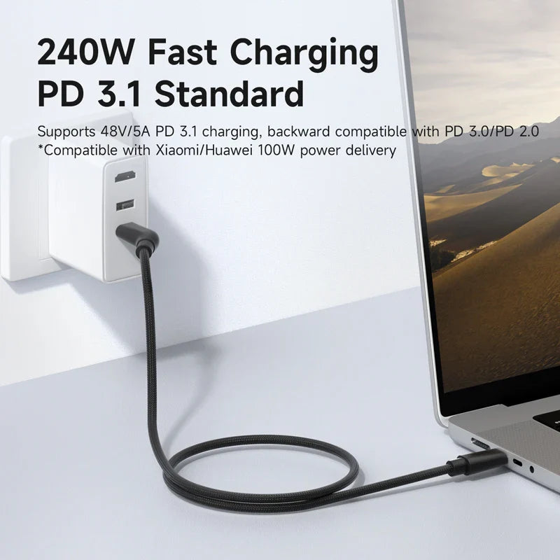 Laptop being charged with a power cable, featuring text about 240W fast charging and PD 3.1 standard.