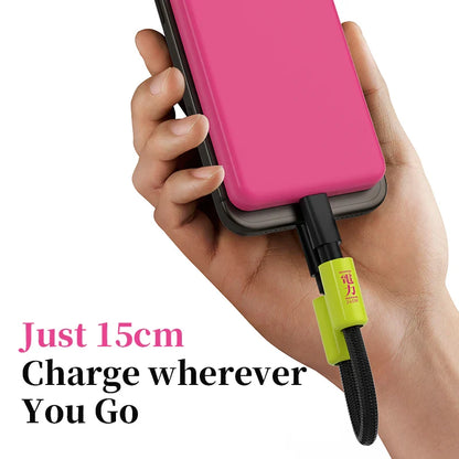 Hand holding a pink phone with a green charging cable, text 'Just 15cm Charge wherever You Go'.