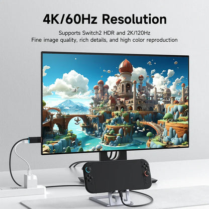 Monitor displaying a vibrant game scene with text about 4K/60Hz resolution and gaming accessories.